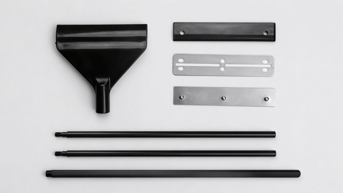 Replaceable blade system parts of an aquarium algae scraper laid out on white background